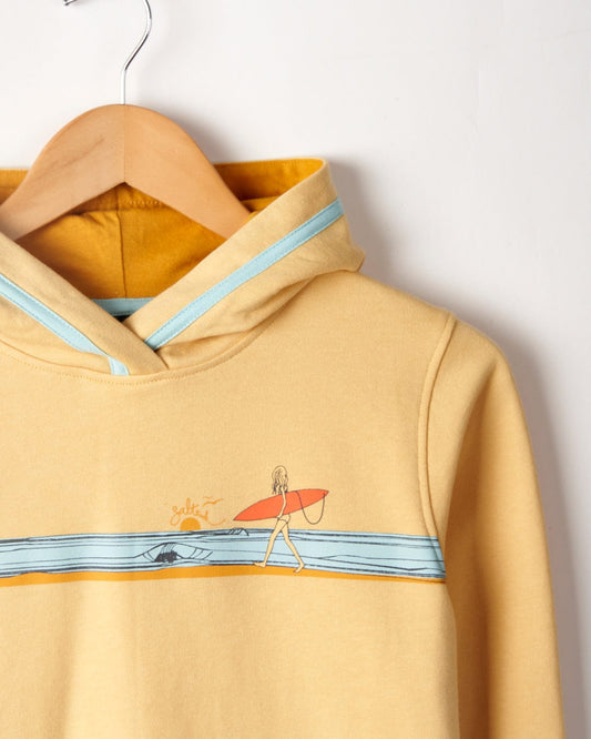 Yellow hoodie with a Saltrock surfing-themed graphic design, featuring a surfer carrying a board, hanging on a hanger against a plain background.