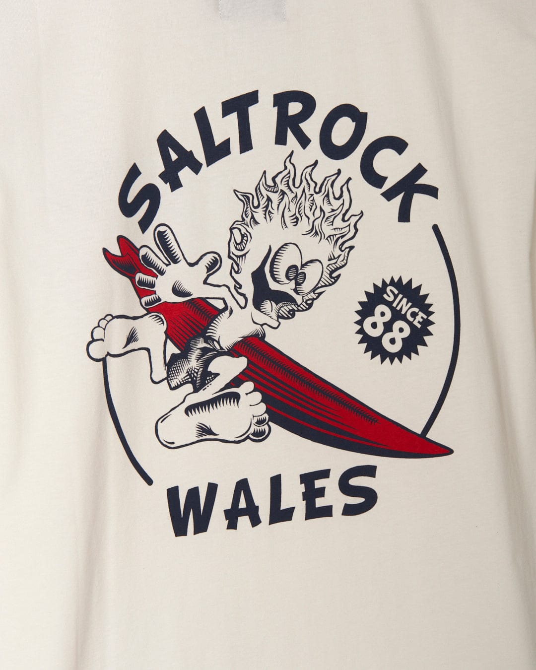 A **Saltrock** white t-shirt with branding that says Salt Rock Wales.