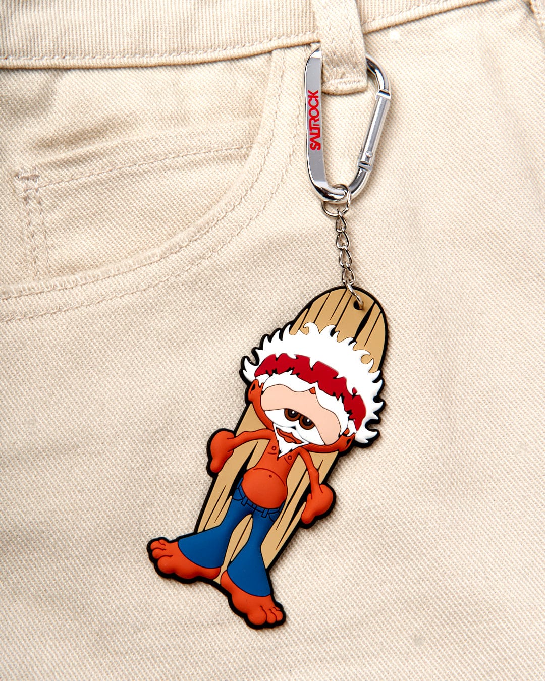 A keychain with a cartoon character, Saltrock Woodstock Keyring, attached.