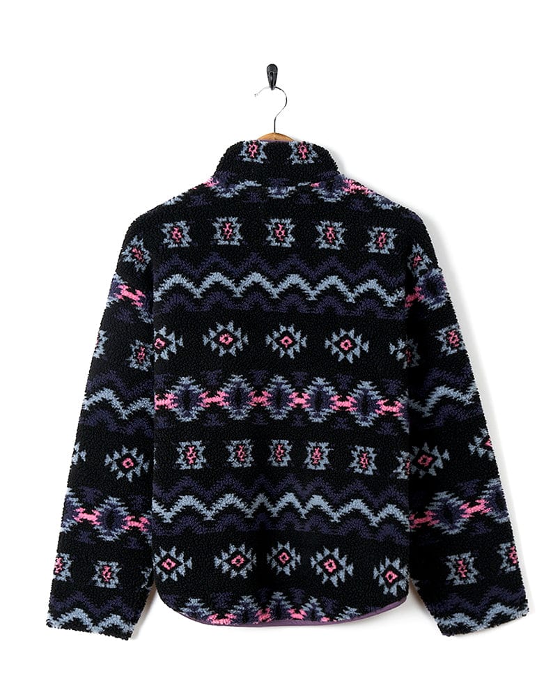 A black and pink Zella - Kids Fleece - Black jacket with an aztec pattern by Saltrock.
