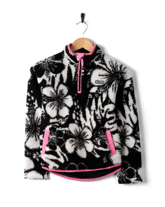 Women's Zella - Kids Hibiscus Fleece - Black jacket with pink accents on a hanger against a white background. (Saltrock)