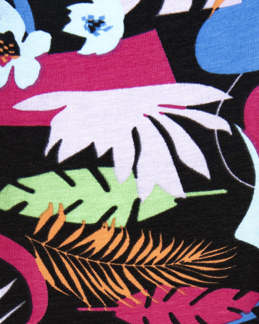 A close up image of a Saltrock Zephyr - Kids Leggings - Black with colorful leaves and flowers.