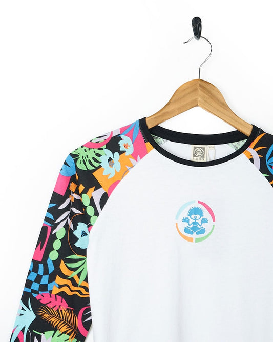 A Saltrock Zephyr Tok - Kids Raglan Long Sleeve T-Shirt - White with a colorful print.