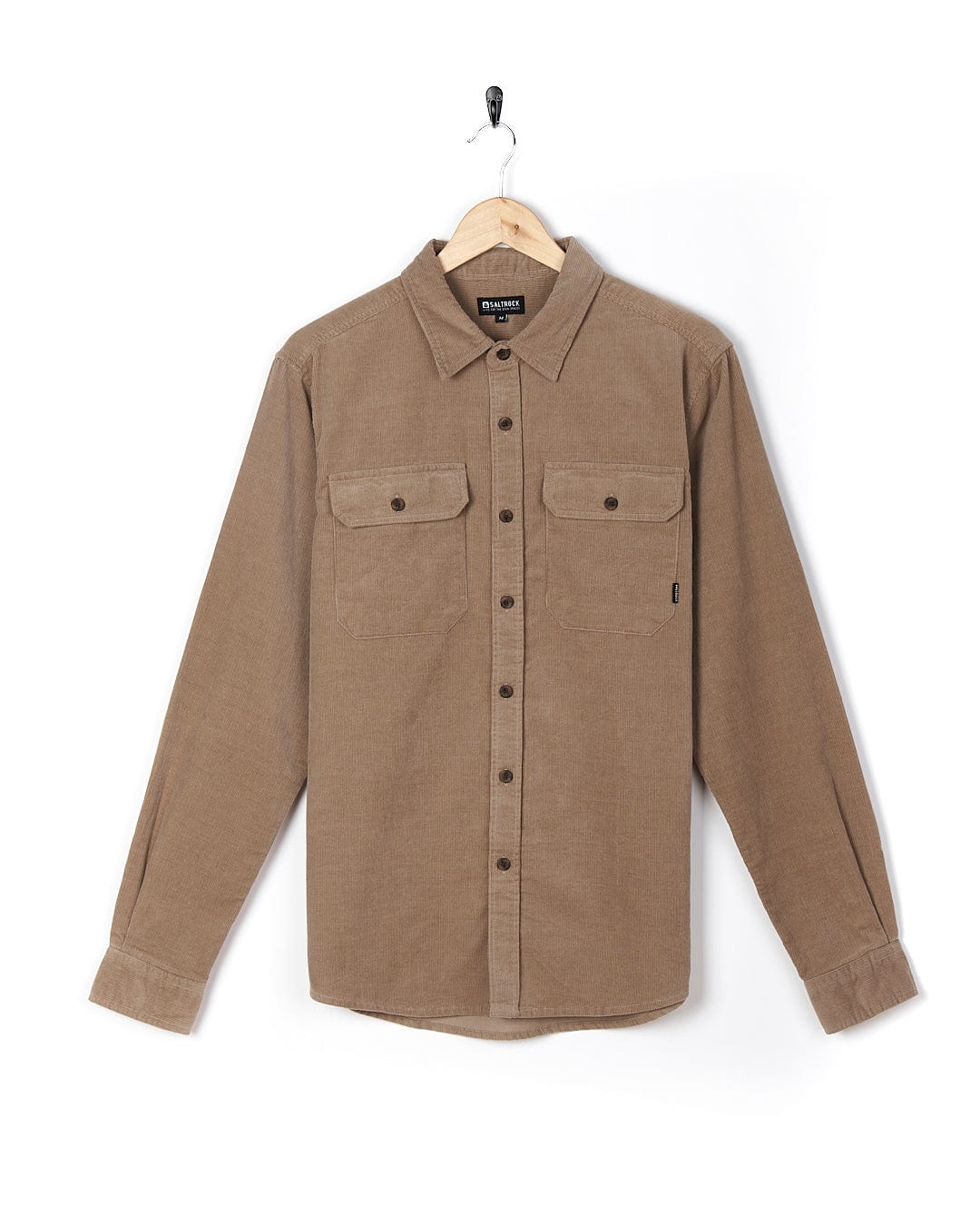 An Ace - Men Corduroy Shirt - Light Brown by Saltrock hanging on a hanger.