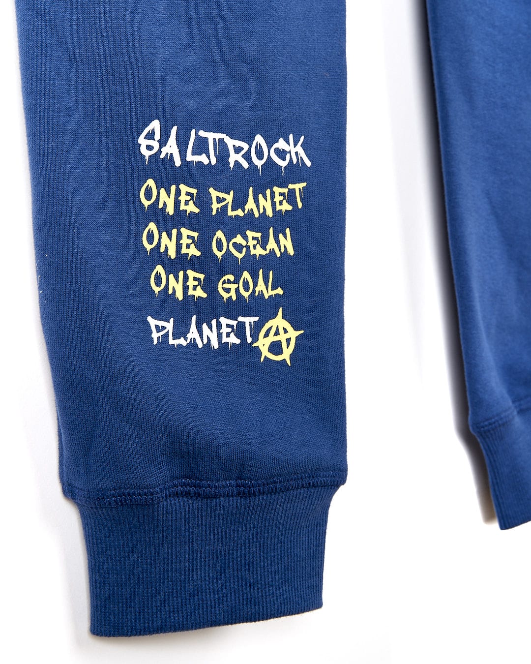 A Saltrock Activist A - Kids Jogger - Dark Blue sweatshirt that says one planet, one soul, one planet.