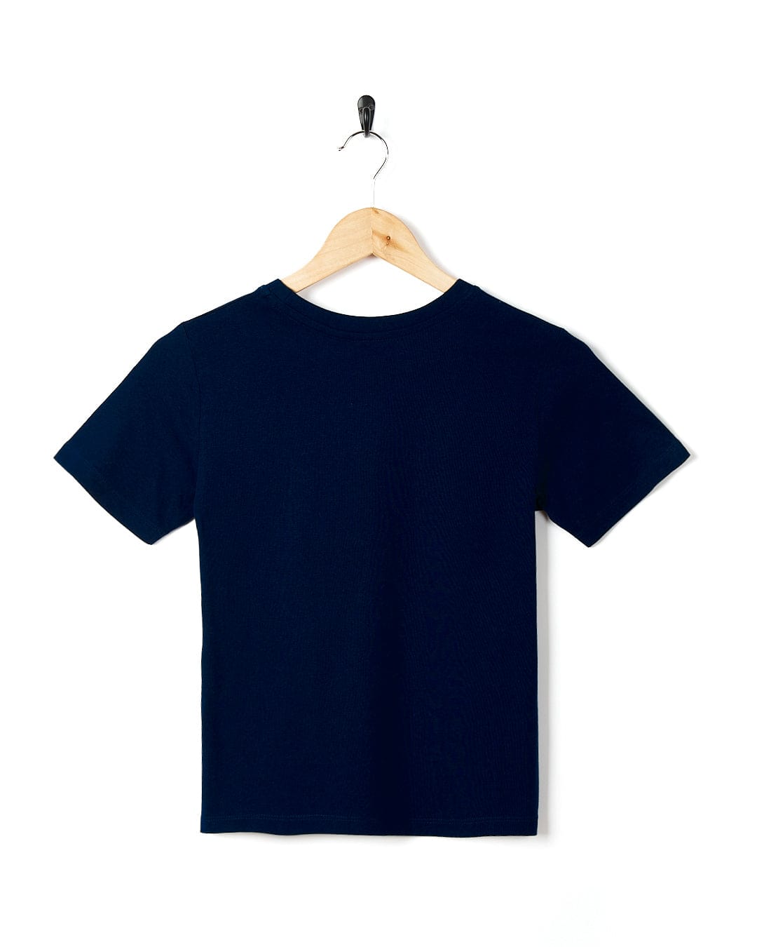 A Beach Patrol - Kids Short Sleeve T-Shirt - Blue from Saltrock hanging on a wooden hanger.