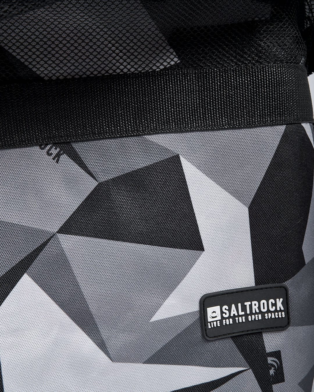 A Saltrock Camo Core - Double Bodyboard Bag - DARK GREY with a black and grey pattern on it.