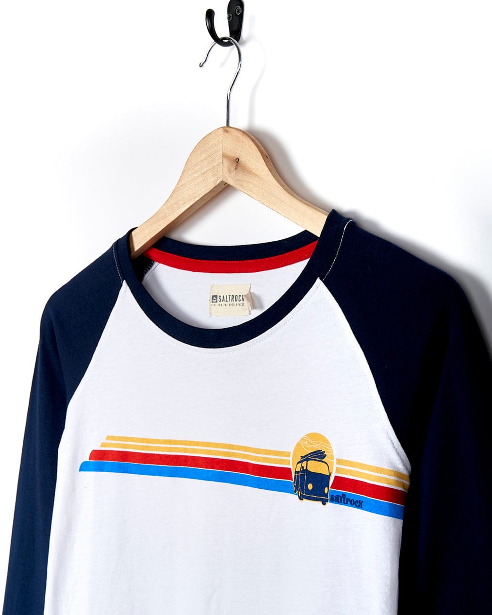 A Saltrock Celeste Stripe - Womens Long Sleeve Raglan T-Shirt - White/navy with a red, blue and yellow stripe.