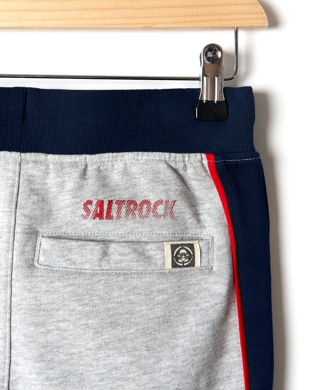 A pair of Curby - Kids Jogger - Grey with the brand name Saltrock on them.
