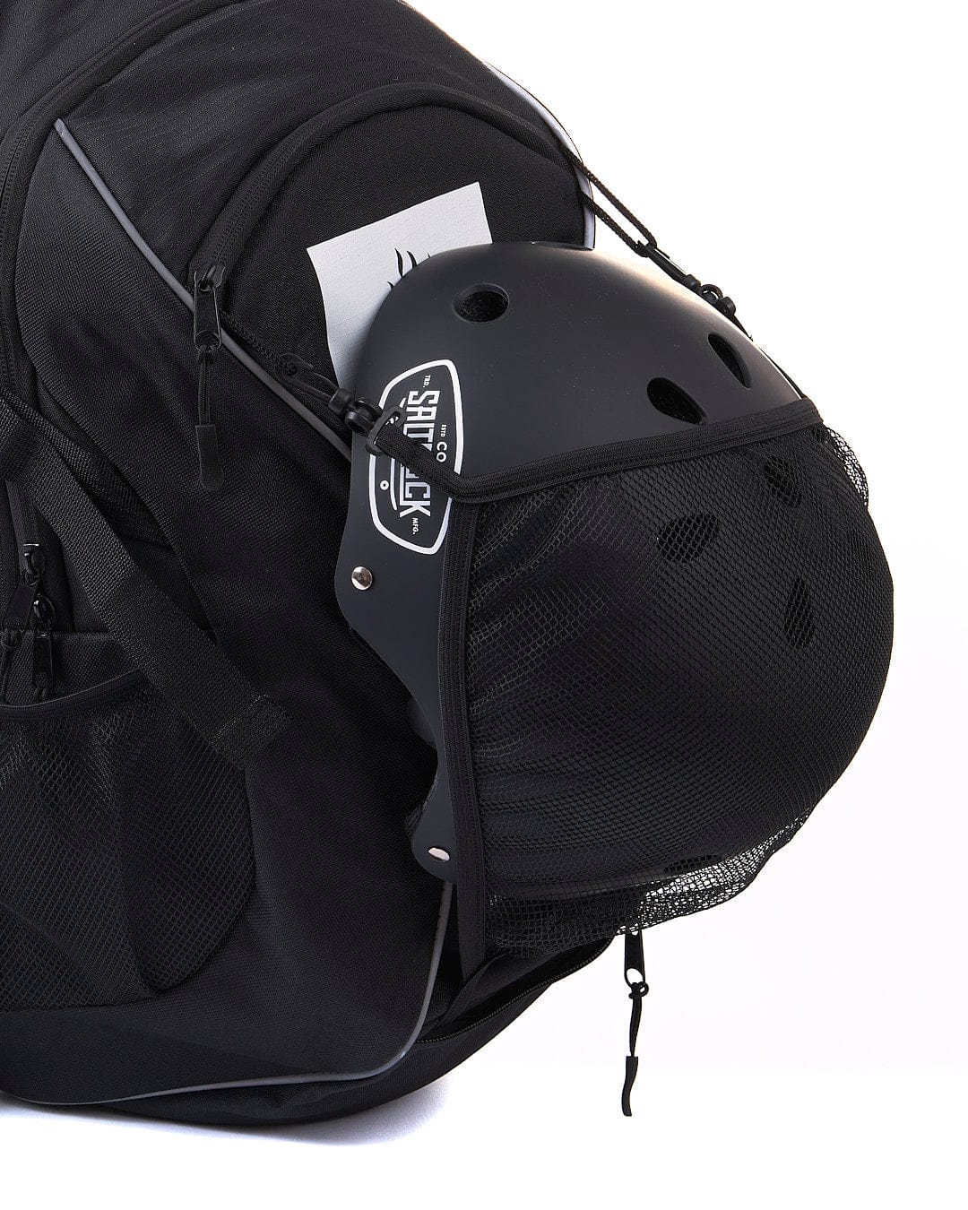 A Cyclone - Urban Backpack - Black by Saltrock with a helmet attached to it.