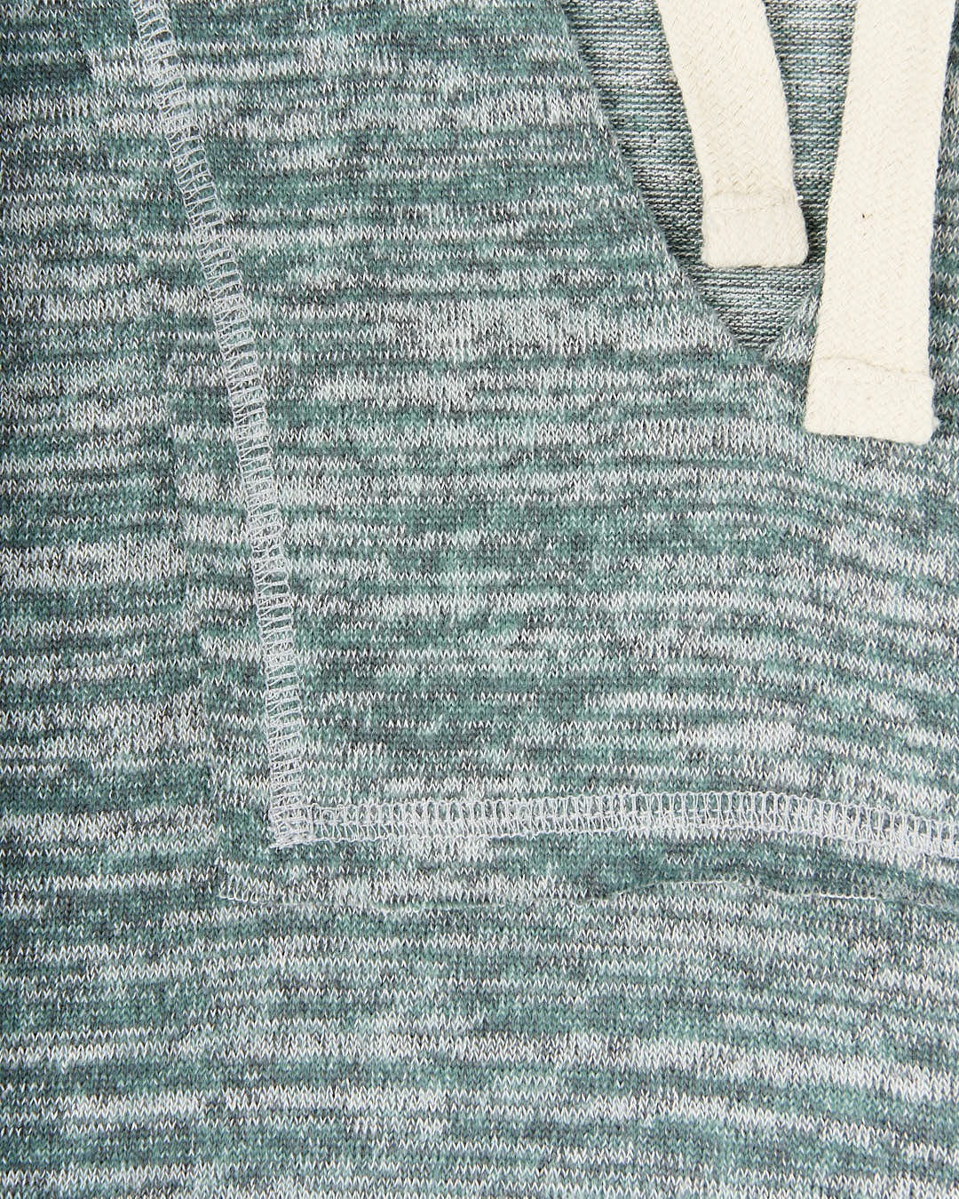 A close up of a Daydreamer - Womens Pop Hoodie in Green with white trim by Saltrock.