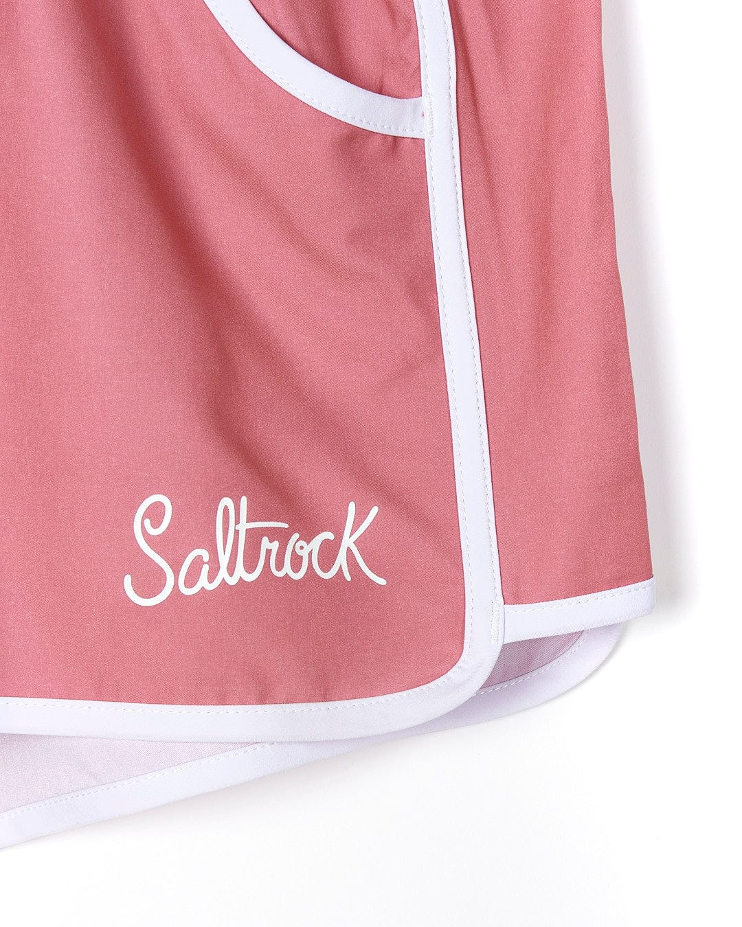 A pink elasticated waist Fonte Volley - Womens Boardshort with the word Saltrock on it.