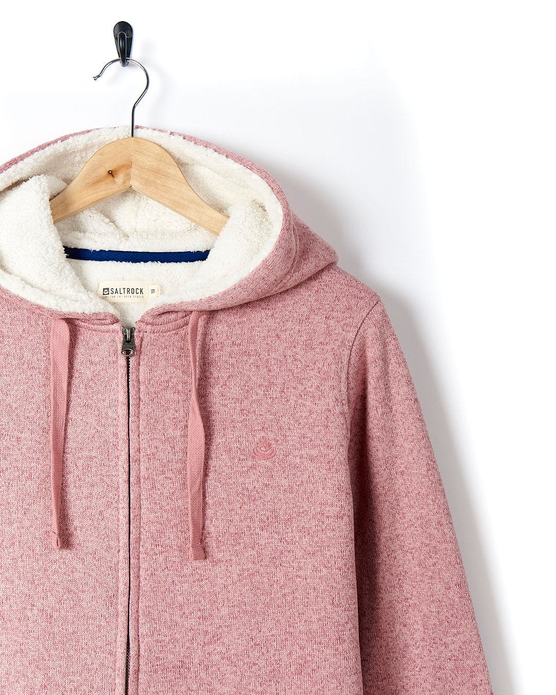 A cozy Galak - Womens Fur Lined Hoody - Pink by Saltrock hanging on a hanger.