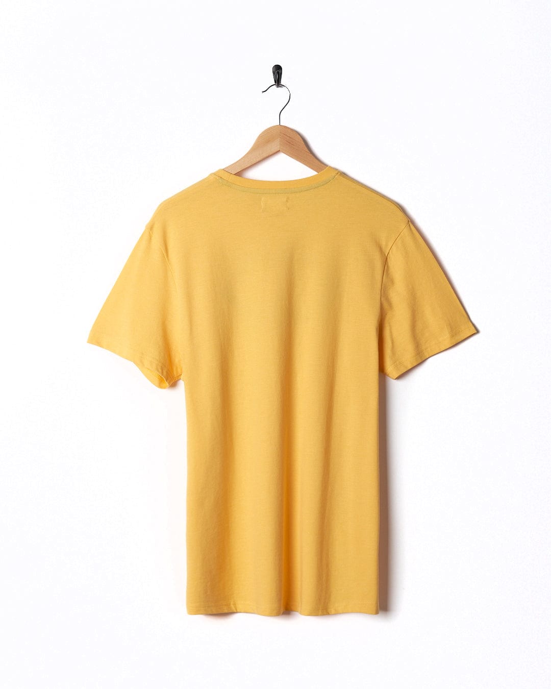 A Saltrock Gradient Hex - Mens Short Sleeve T-Shirt - Yellow hanging on a white wall.
