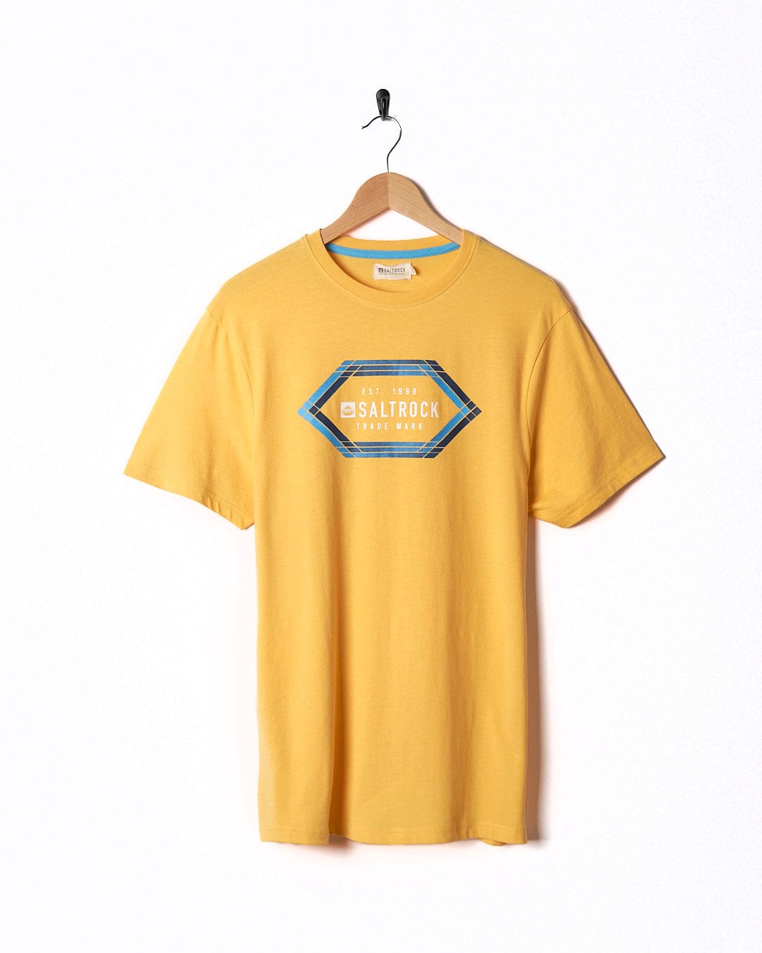 A Saltrock Gradient Hex - Mens Short Sleeve T-Shirt - Yellow hanging on a wall.