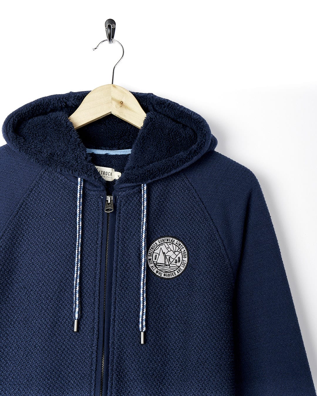 A Saltrock Hall - Mens Orkney Borg Lined Hoodie - Dark Blue with a badge on it.