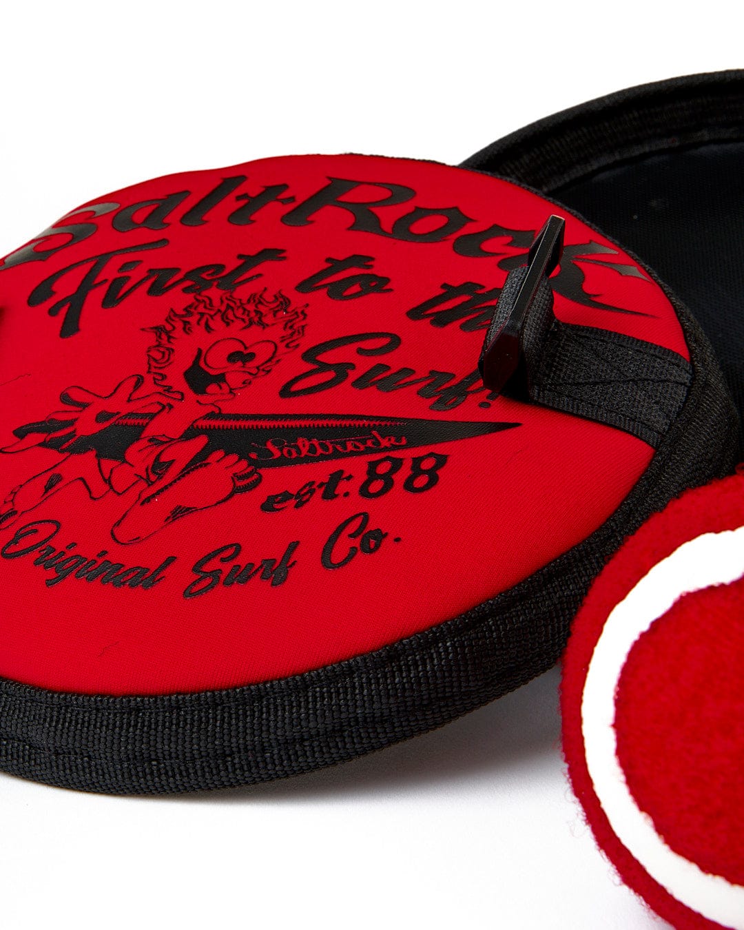Two Jonty Catch Ball Sets - one in red and one in black, perfect for beach games by Saltrock.