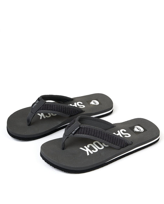 A pair of black flip flops with the word skuck on them, perfect for fans of Saltrock or Lineup - Cord Flip Flops - Dark Grey.