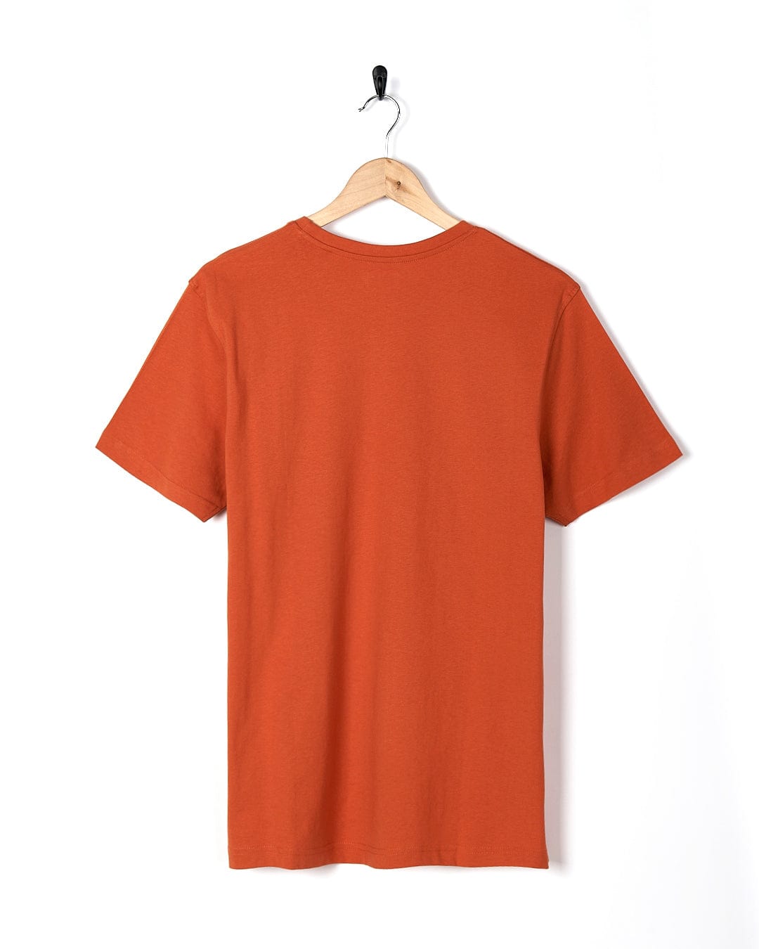A Saltrock Live Life Location - Mens Short Sleeve T-Shirt - Orange hanging on a hanger.