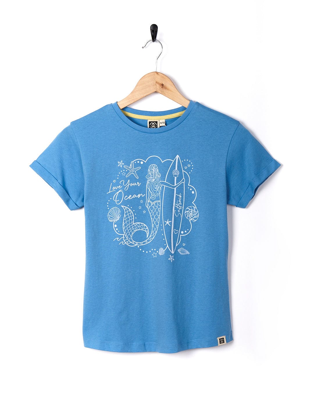A Mermaid Surf - Kids Short Sleeve T-Shirt - Light Blue by Saltrock, perfect for those who love the surf lifestyle or are mer-people enthusiasts.