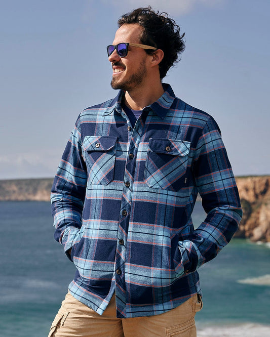 A man wearing the Saltrock Ocean - Mens Borg Lined Shirt - Blue.