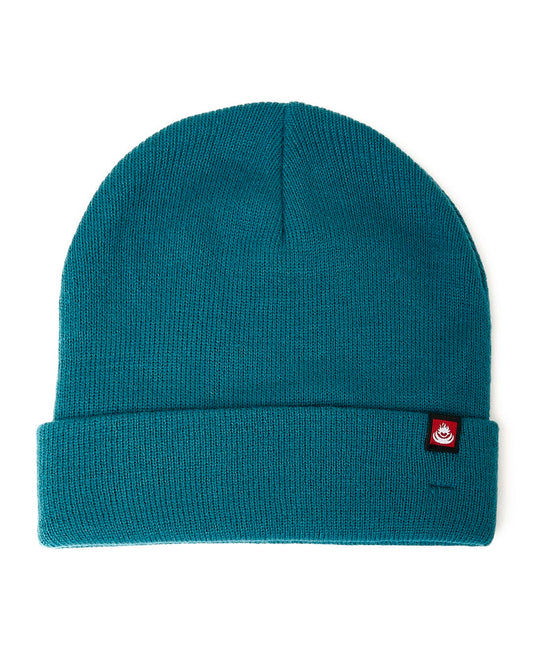 A Saltrock Ok - Tight Knit Beanie - Blue with a red logo on it.