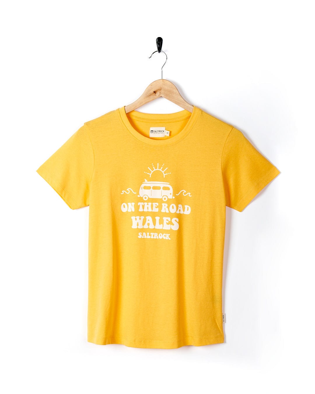 A Saltrock yellow t-shirt that says "On The Road Wales" holds