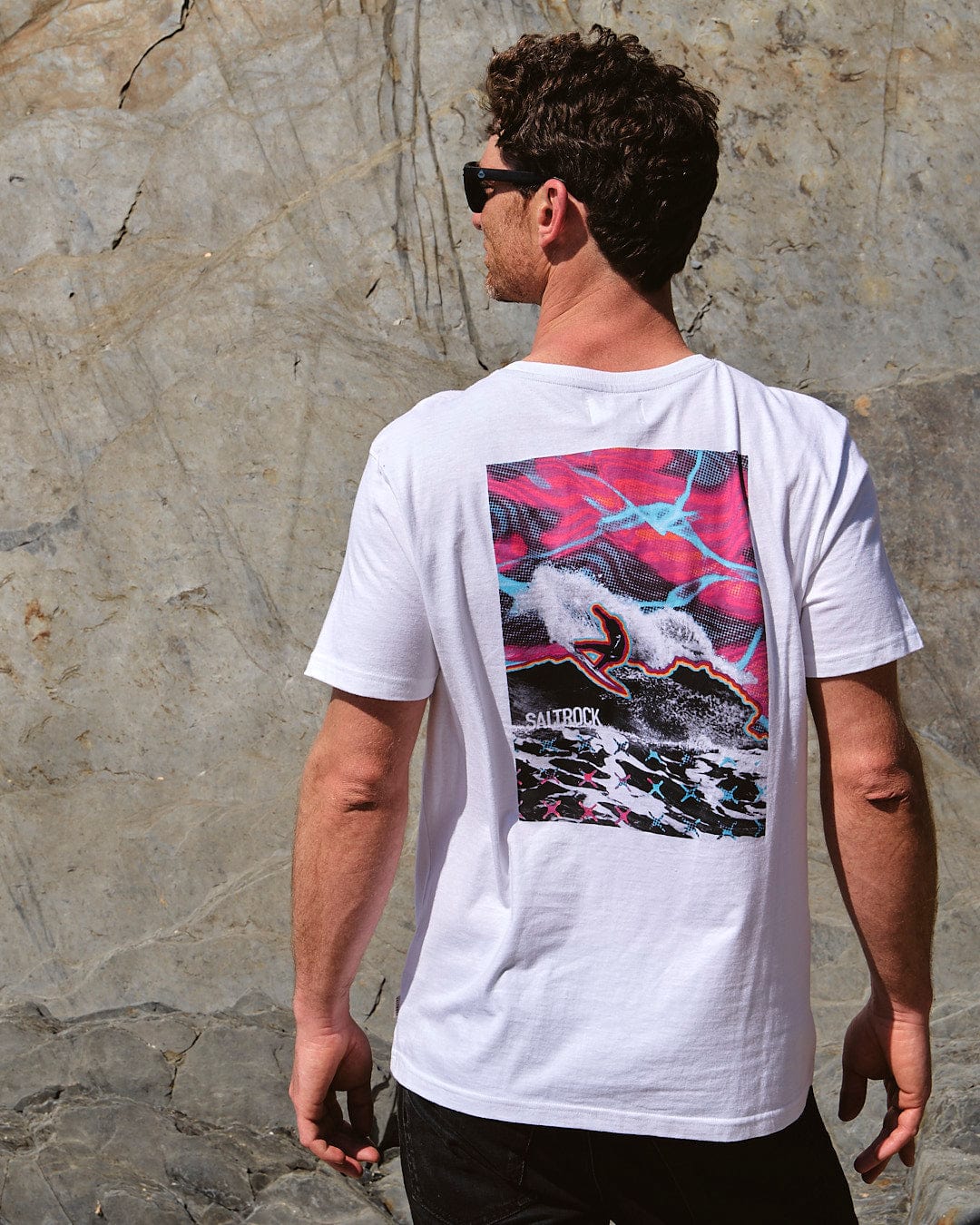 The back of a man wearing sunglasses and a Saltrock Poolside Wave - Mens Short Sleeve T-Shirt - White.