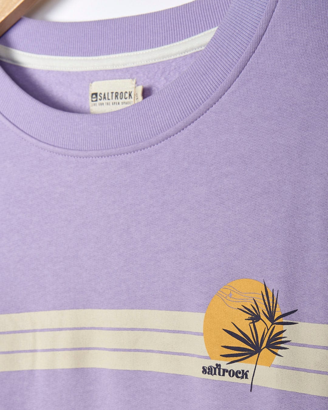 A Saltrock Poster Stripe - Womens Crew Sweat - Light Purple with a palm tree on it.