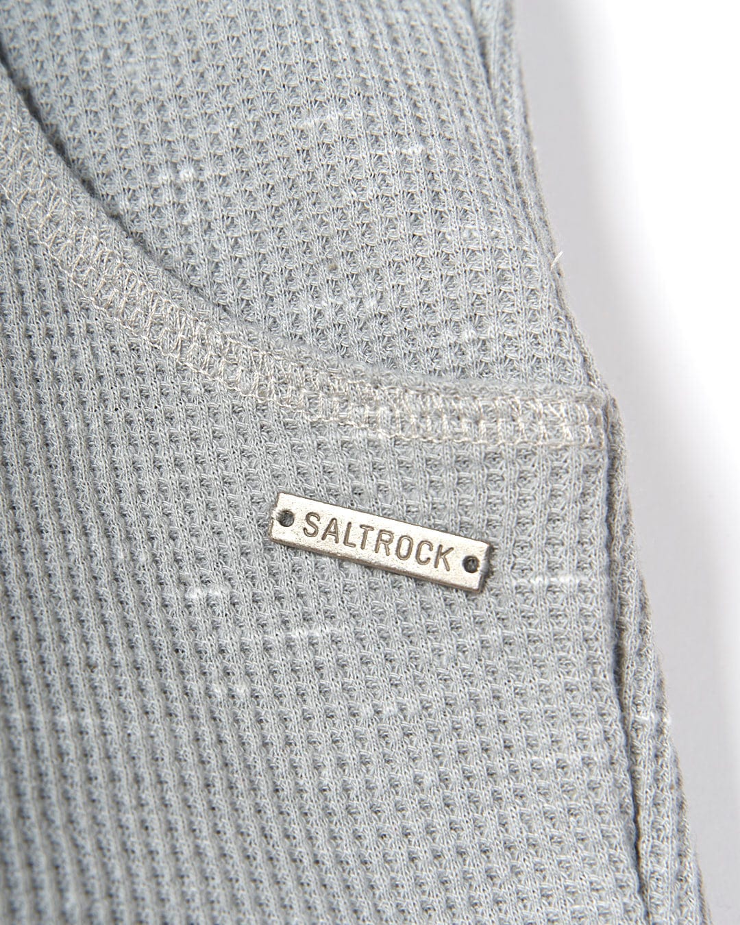 A close up of a Rosalin - Womens Sweat Short - Light Grey with the word Saltrock on it.