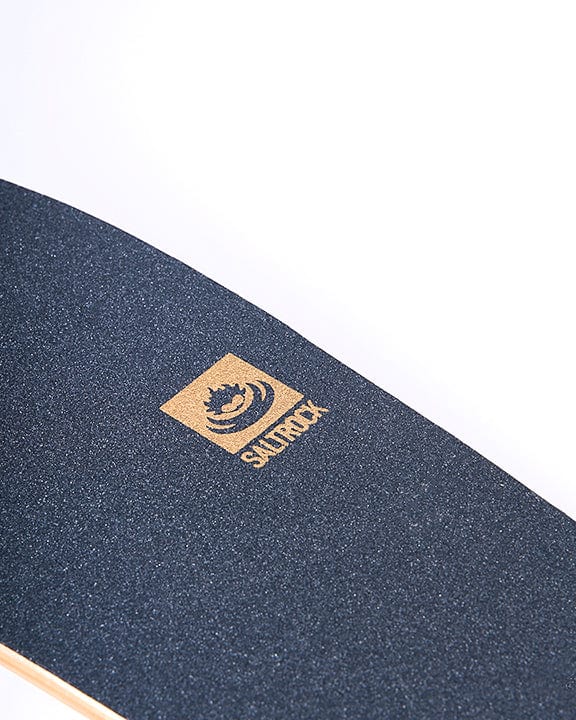 A Running Man Limited Edition - Mini Wooden Cruiser - Dark Yellow skateboard with a gold Saltrock logo on it.