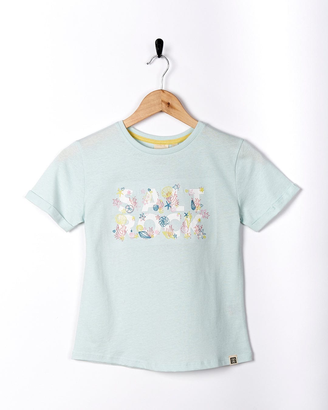 A Saltrock Seabed - Kids Short Sleeve T-Shirt - Light Blue with flowers on it.