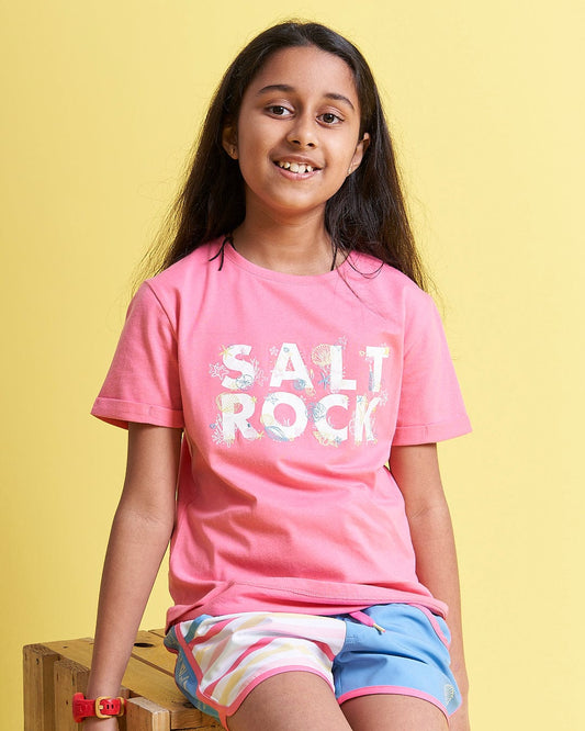 A girl sitting on a Seabed - Kids Short Sleeve T-Shirt - Pink by Saltrock.