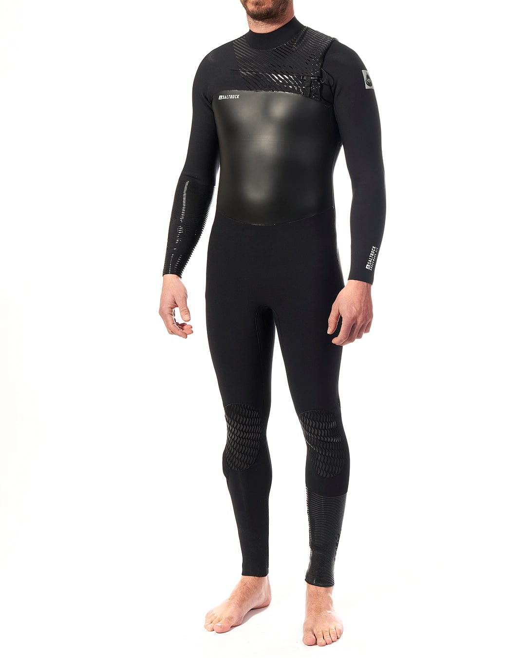 A man in a Saltrock Shockwave - Mens 3/2 Chest Zip Full Wetsuit - Black standing on a white background.
