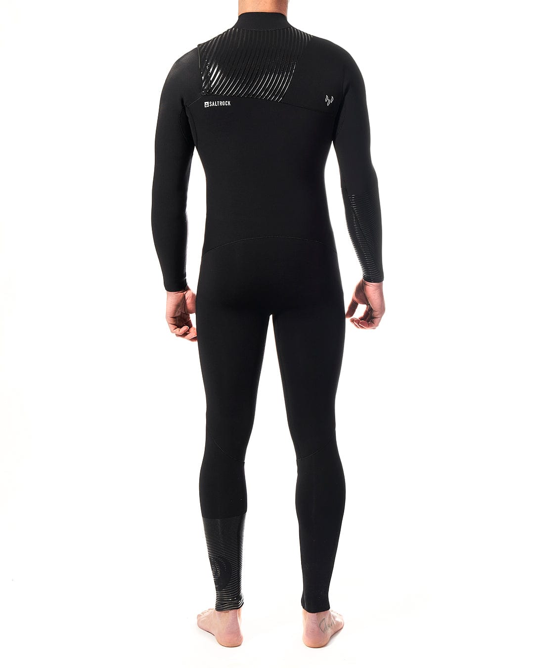 The back view of a man in a Saltrock Shockwave - Mens 3/2 Chest Zip Full Wetsuit - Black.