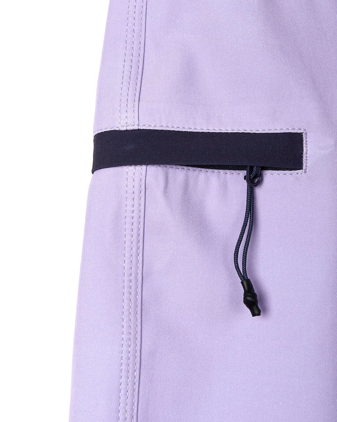 A close up of the pocket of a Saltrock Shoreline - Womens Boardshort - Light Purple.