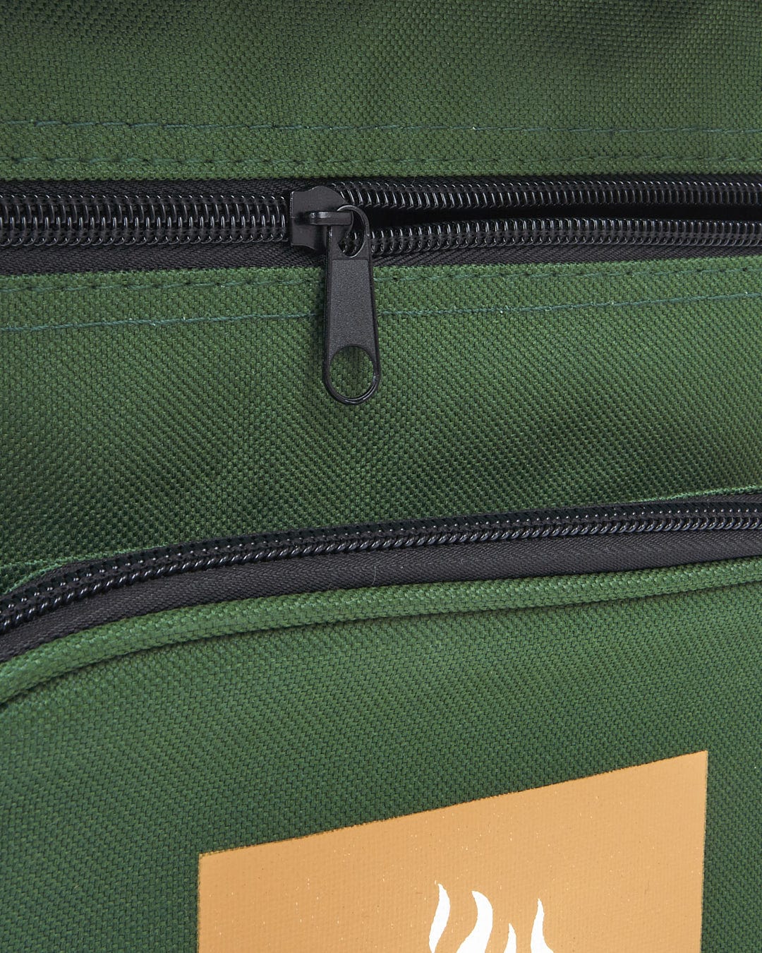 A close up of a Saltrock Spectator - Foldable Chair with Cooler Bag - Dark Green backpack with a logo on it.