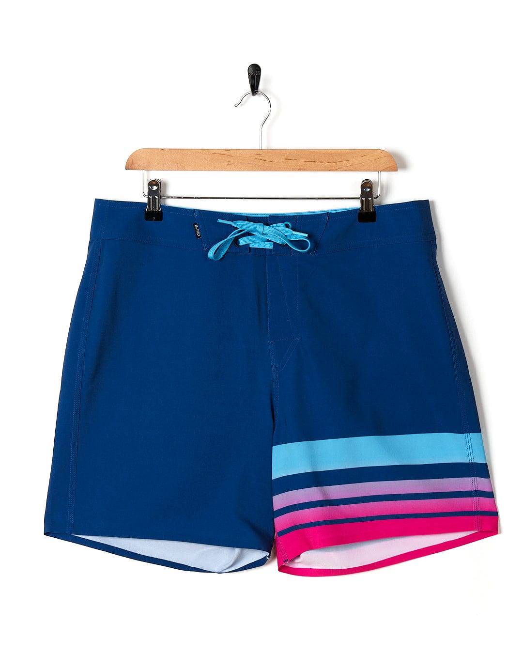 A Splash Gradient - Mens Boardshort - Dark Blue by Saltrock with pink and blue stripes.