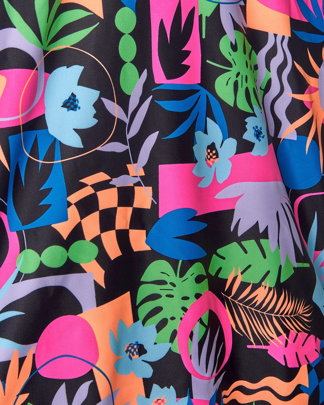 A close up of a Sunny Zephyr - Swimsuit - Black Print fabric by Saltrock.