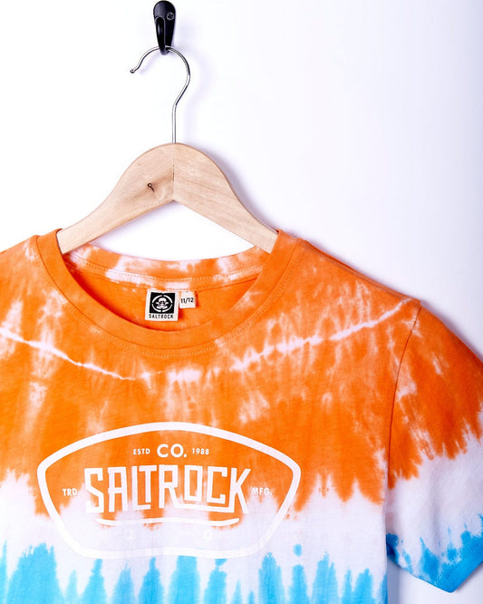 A Sunray Skate - Boys Tie Dye Short Sleeve T-Shirt - Orange from Saltrock hanging on a hanger.