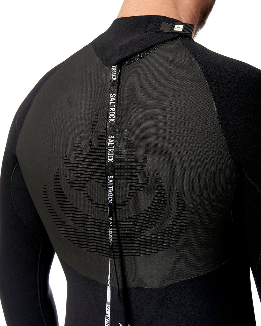 The back view of a man wearing a Saltrock Synthesis - Mens 4/3 Back Zip Full Wetsuit - Black.